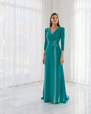 Couture Club 1G07 – Τυρκουάζ μακρύ φόρεμα με κεντημένες λεπτομέρειες και σταυρωτό μπούστο